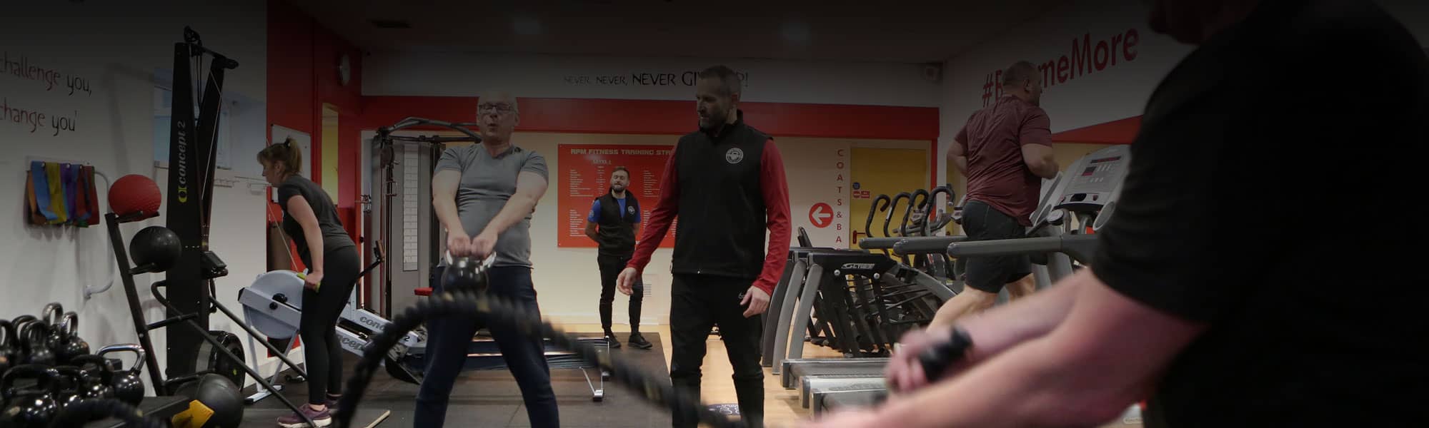 Coaching at small group fitness class