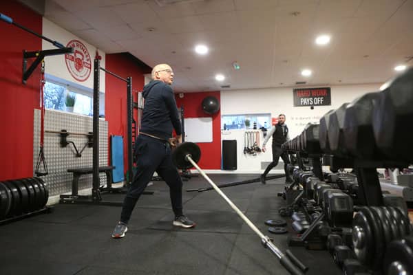 Man with personal trainer